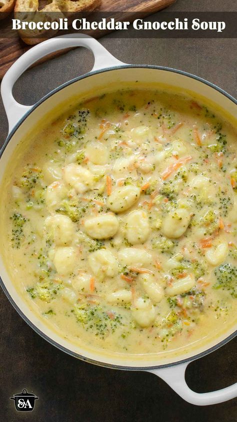 Overhead view of Broccoli Cheddar Gnocchi Soup in a large white Dutch Oven. Broccoli Cheese Gnocchi Soup, Broccoli Cheddar Gnocchi Soup, Gnocchi And Broccoli Recipes, Soup Recipes Broccoli Cheddar, Brócoli Cheddar Soup, Orecchiette Soup, Gnocchi Soup Recipes, Soup With Broccoli, Potato Cheddar Soup