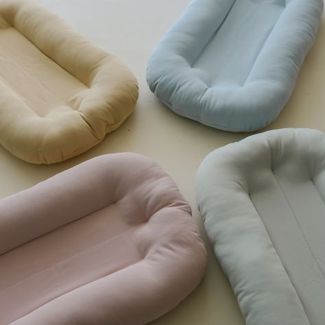 What is the Snuggle Me for?The Snuggle Me is uniquely designed to hug your baby's body and create a cozy space to play. The Snuggle Me is designed for actively engaging, playing, and bonding with your awake little one. The Infant Lounger is not for sleep. What age is the Snuggle Me suitable for? The Infant Lounger is suitable for babies aged 0-9 months. For older babies, we recommend transitioning to a Toddler Lounger only when they are 12 months+, 21" from head to bum(not feet) and are a strong Newborn Things, Infant Lounger, Snuggle Me Organic, Snuggle Me, Baby Registry Essentials, Baby Lounger, Baby Wishlist, Being Held, Baby List