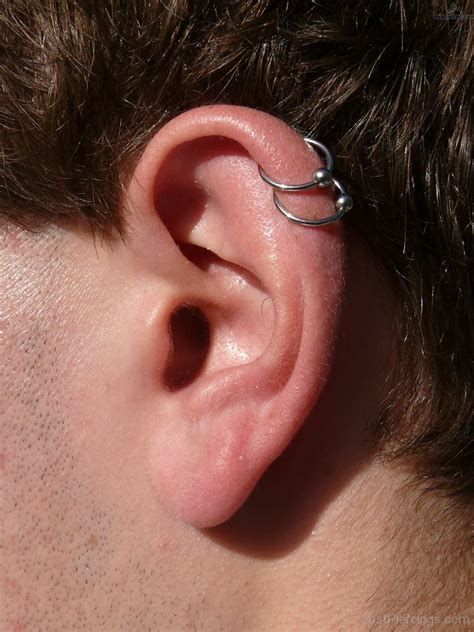 Cartilage Piercing Men, Wolf Outfit, Guys Ear Piercings, Double Helix Piercing, Men's Piercings, Double Cartilage Piercing, Types Of Ear Piercings, Ear Piercings Helix, Helix Piercings