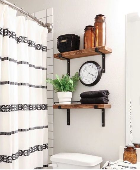 bathroom shelving with wood and metal brackets instead of cabinets above toilet #bathroomshelving #openshelving #diyshelves Cabinets Above Toilet, Cabinet Above Toilet, Design Interior Baie, Above Toilet, Shelves Above Toilet, Bathroom Shelving, Shelving Design, Decor Baie, Diy Bathroom Decor