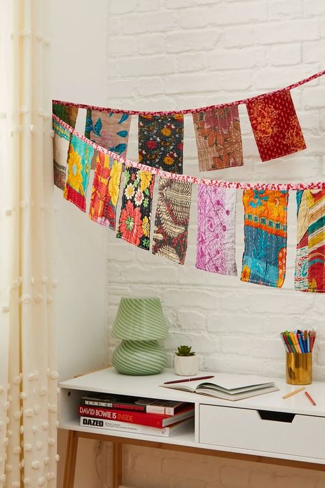 Hang boho textures up in your space with this wall banner. Features a Kantha flag design with multiple prints and colourways. Strung together by a colourful thread and finished with raw-cut seams. Indian Curtains, Flag Wall Decor, Clean Crafts, Boho Texture, Indian Interiors, Kantha Embroidery, Wall Flag, Wall Banner, Dorm Room Essentials