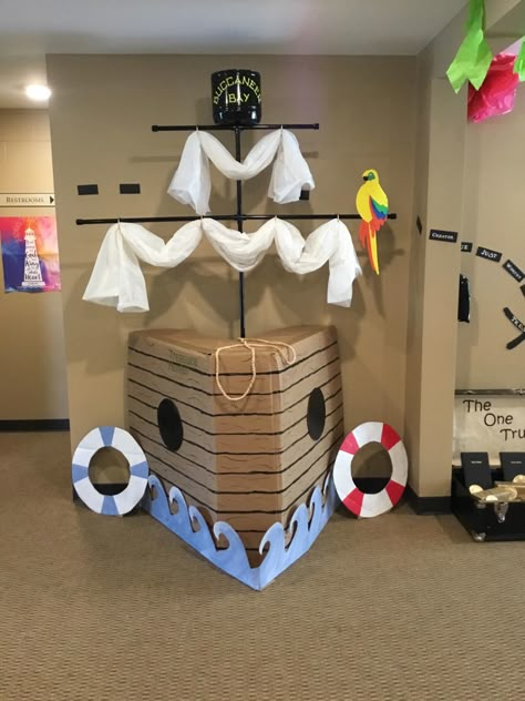 Cardboard Boat Decoration, Pirate Boat Diy Cardboard Boxes, Pirate Ship From Cardboard Boxes, Ship Mast Diy, Cardboard Box Pirate Ship, Pirates Decorations Party, Cardboard Pirate Ship Diy How To Make, Pirate Boat Diy, Ship Theme Decor