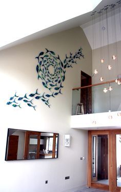 Ceramic Wall Installation, Double Height Hallway, Fish Installation, Staircase Wall Decor, Fish Decor, Handmade Ceramic Planters, Art Designs Ideas, Fish Wall Decor, Glass Fusing Projects