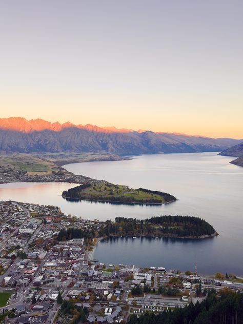 Photo: Skyline  Queenstown, New Zealand  Queenstown is a top travel destination due to its stunning natural beauty, offering a backdrop of majestic mountains and pristine lakes. It's renowned for adrenaline-pumping activities like bungee jumping and skydiving, as well as world-class skiing in winter. The town itself is vibrant, with a bustling dining scene, charming cafes, and eclectic boutiques. Additionally, its proximity to renowned vineyards makes it a haven for wine lovers. Whether seeking adventure or relaxation, Queenstown offers an unforgettable experience in one of the world's most picturesque settings. Queenstown In Winter, Queenstown Aesthetic, Queenstown Winter, New Zealand Queenstown, Queenstown New Zealand Aesthetic, New Zealand Aesthetic, New Zealand Winter, Queenstown New Zealand, Milford Sound