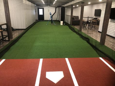 Indoor Batting Cage Basement, Batting Cage In Basement, Batting Cage Facility, Baseball Basement Ideas, Baseball Cages Indoor, Baseball Garage Ideas, At Home Batting Cage, Garage Batting Cage Ideas, Batting Cages Indoor