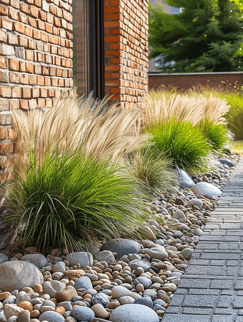 River Stone Garden Ideas, Grasses And Rocks Landscaping, Rock And Grasses Landscaping, Tall Grass Around Pool, Grasses Garden Landscaping, Garden River Rocks Ideas, Front Garden Modern, Landscape With Grasses And Rock, Ornamental Grass Front Yard