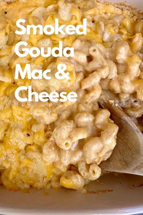 A dish of mac and cheese with s spoon. Mac And Cheese With Smoked Gouda, Smoked Cheddar Mac And Cheese, Smoked Gouda Mac And Cheese Baked, Saucy Mac And Cheese, Muellers Mac And Cheese Recipe, Baked Gouda Mac And Cheese, Mac And Cheese Recipe Gouda, Thanksgiving Mac And Cheese Recipe, Mac And Cheese With Gouda