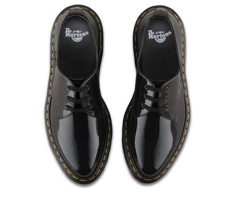 Feminine with a side of rebellion: the Dupree women's shoe slims down our classic 3-eye silhouette, and adds a goth feel with a pointed toe, a grey contrast sole and glossy, high-shine patent leather. Made with Patent Lamper, our classic patent leather Built on the iconic, rebelliously comfortable Dr. Martens Airwair™ air-cushioned sole Sole is slip-resistant with superior abrasion, and is oil and fat resistant, too The sole is secured using one of the most durable construction methods av... Classic Black Patent Leather Shoes, Dr Martens Patent Leather Shoes, Black Patent Leather Lace-up Shoes, Dr Marten Shoes, Black Patent Leather Slip-on Dress Shoes, Dr Martens Store, Womens Dr. Martens 1460 8-eye Patent Boot - Black, Eye Silhouette, Shoes Dr Martens