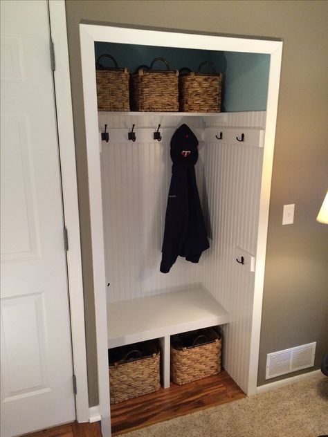 Entry closet mudroom makeover Sherwin Williams Watery & Keystone Grey Baskets from at home Small Mudroom Makeover, Black Entry Closet, Entryway Closet Decor, Small Mudroom Cupboard, Cost Closet Mudroom, Small Entry Closet Mudroom, Mudroom Out Of Closet, Small Hallway Cupboard Ideas, Closet To Cubbies