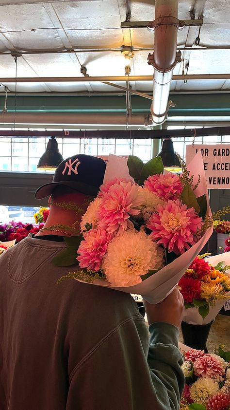 Boyfriend holding flowers at a market Cute Flowers From Boyfriend, Guys With Flowers Aesthetic, Flowers Aesthetic From Boyfriend, Man Giving Flowers To Woman Aesthetic, Man Buying Flowers Aesthetic, Flowers Bouquet Boyfriends, Bf Giving Gf Flowers, Hand Picked Flowers Boyfriend, Boyfriend Getting Flowers