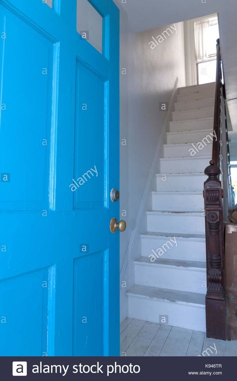 Download this stock image: A staircase facing a front door, which is considered to be bad feng shui because good energy escapes right out the entrance. - K946TR from Alamy's library of millions of high resolution stock photos, illustrations and vectors. Bad Feng Shui, Good Energy, Feng Shui, Locker Storage, Front Door, Photo Image, Entrance, High Resolution, Stock Images