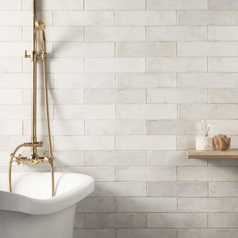 Modern meets rustic with the Vandalay Collection, offering a unique reinvention of the hexagon and subway tiles. With worn edges and a uniquely textured surface featuring a reflective chameleon ink, this series redefines vintage with contemporary colors and a depth of design. Artmore Tile Vandalay 22-Pack White 3-in x 12-in Polished Ceramic Subway Wall Tile | EXT3RD107690 Kalay, White Shower Tile, Artmore Tile, Glossy Ceramic Tile, Cream Tile, Subway Tile Showers, Subway Tiles Bathroom, Shower Wall Tile, Backsplash Wall