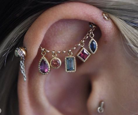 Earrings Aesthetic Piercing, Interesting Ear Piercings, Ear Piercing Jewelry Ideas, Maximalist Ear Piercings, Colorful Piercings, Hippie Ear Piercings, Creative Piercings, Boho Piercings, Asymmetrical Ear Piercings