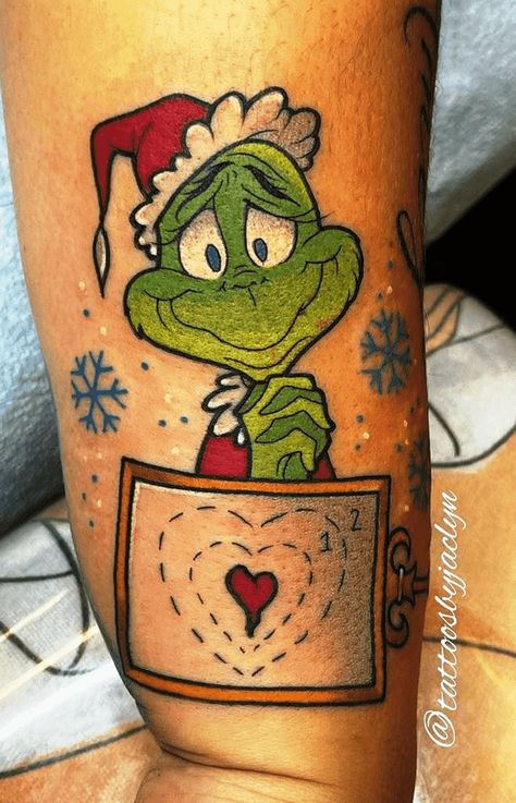 Christmas Tattoo Design Images (Christmas Ink Design Ideas) Grinch Tattoos Ideas, Grinch Tattoo Ideas Small, Grinch Tattoo, Holiday Tattoos, Christmas Tattoo Ideas, Tattoo Special, Cartoons Tattoo, Christmas Tattoos, Winter Tattoo