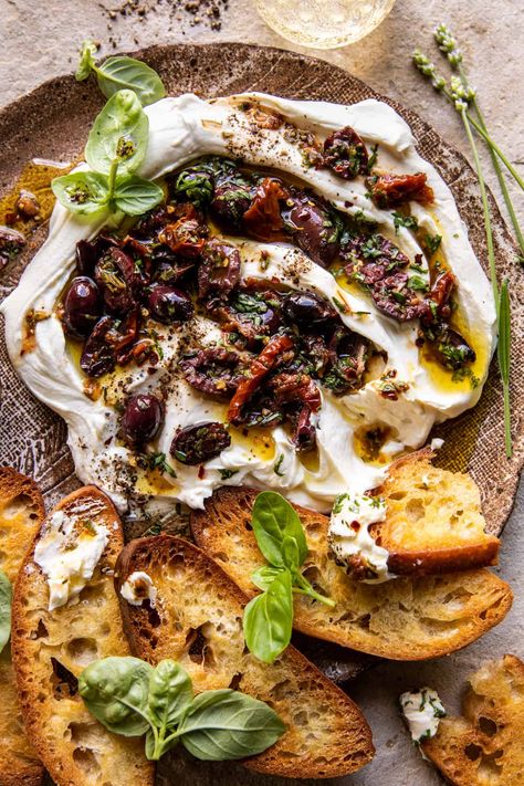 Honey Whipped Goat Cheese with Marinated Olives | halfbakedharvest.com Feta Goat Cheese Dip, Whipped Cheese Appetizer, Honey Goat Cheese Recipes, Whipped Goat Cheese Dip, Honey Whipped Goat Cheese, Goat Cheese Honey, Roasted Olives, Goat Cheese Dip, Half Baked Harvest Recipes