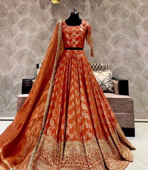 Made to Order/Measurement/Custom Order Lehenga - Color : orange - Fabric : Pure Banarasi meenakari Silk - Fully flared paneled lehenga -   Pure Banarasi meenakari Silk -   Attached  Dupatta with Blouse - Drawstring closure with Tassels - - It can be customize in any design or size  PLEASE NOTE: BUYERS ARE RESPONSIBLE FOR ANY CUSTOMS AND IMPORT TAXES THAT MAY APPLY. This is a made to order product. If you opt for 'Made To Measurement Option', we will provide a measurement template and you can sha Banarasi Lehenga Choli Design, Orange Lehenga Pakistani, Orange Color Lehenga, Silk Lehenga For Bride, Orange And Pink Lehenga Color Combos, Siders Lehenga For Wedding, Mother Of Bride Lehenga, Silk Choli Designs Lehenga, Dark Orange Lehenga