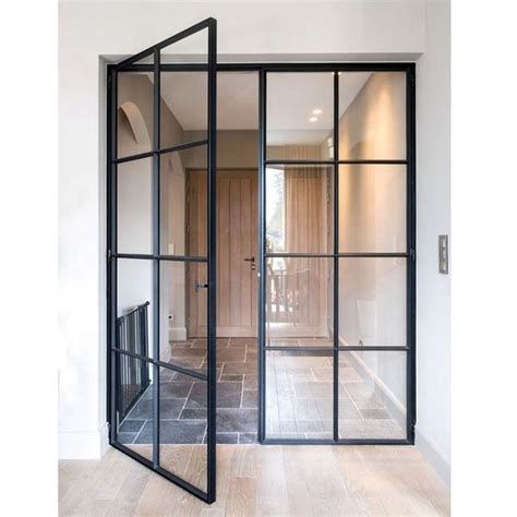 entry door at building corner at DuckDuckGo Glass Office Doors, Black French Doors, Steel French Doors, Double Doors Interior, Iron Entry Doors, Glass French Doors, French Doors Patio, Glass Doors Interior, Wrought Iron Doors