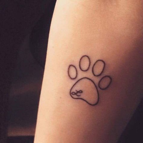 47 Tiny Paw Print Tattoos For Cat And Dog Lovers | Revelist Tatoo Dog, Tiny Paw Print, Small Dog Tattoos, Dog Memorial Tattoos, Pawprint Tattoo, Dog Paw Tattoo, Paw Tattoo, Original Tattoos, Memorial Tattoo