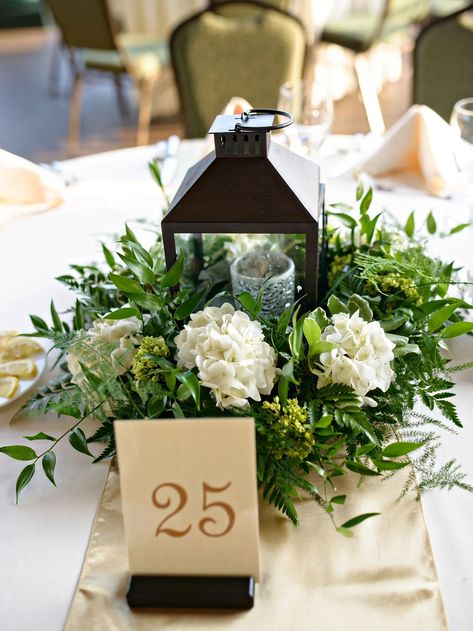 30 Greenery Centerpieces to Decorate Your Wedding Tabletops Black Lantern Centerpiece, Greenery Centerpieces, Dollar Store Christmas Decorations, Lantern Centerpiece, Lantern Centerpiece Wedding, Green Centerpieces, Dollar Store Christmas Crafts, Greenery Centerpiece, Lantern Centerpieces