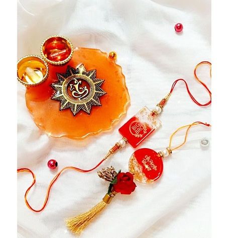 Resin pooja thalis available in different sizes 4” resin pooja thali starting at rs 299 6” resin pooja thali starting at rs 599 8” resin pooja thali starting at rs 799 10” resin pooja thali starting at rs 999 (Price will be changed according to designs of particular thalis) Get free bhai and bhabhi resin rakhi in each pooja thali ♥️ #resinpoojathali #resinpoojaplate #resinpoojathalis #resinpoojathaali #resinpoojathaliforrakshabandhan #poojathalidecoration #resinpoojathaliorders #viralpost #... Resin Rakhi Ideas, Pooja Thali Decoration Ideas, Rakhi Resin, Resin Pooja Thali, Thali Ideas, Thali Decoration Ideas, Rakhi Making, Thali Decoration, Tray Resin