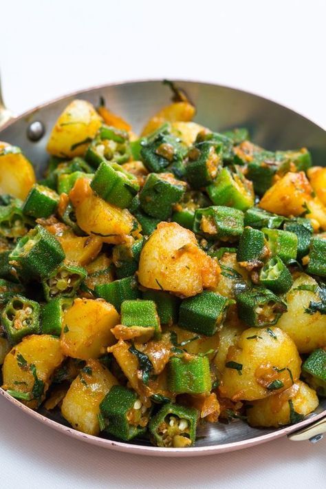 Many people are sceptical about okra, as the texture can be unpleasant when overcooked, but this aloo bhindi recipe from Michelin-starred Indian chef Peter Joseph shows how to make this underrated vegetable shine. Bhindi Recipe, Okra Recipes, Indian Restaurant, Tikka Masala, Indian Food Recipes Vegetarian, Samosa, Indian Cooking, Veg Recipes, Indian Dishes