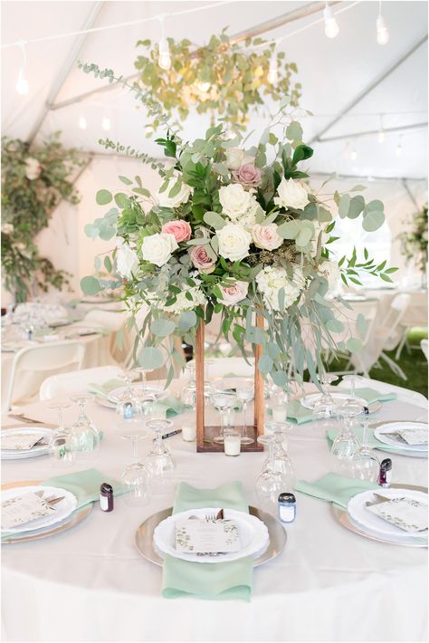 tall flower centerpieces with mint green accents during tented reception at the Lily Inn - Venue | ​The Lily Inn Photography | Idalia PhotographyCake | ​L & M Bakery Florals | ​Flowers by Kristina Hair + Makeup | ​Krista Bencivenga Mint Centerpiece Wedding, Mint Green Centerpieces, Pink And Seafoam Wedding, Mint And Pink Wedding Theme, Blush Pink And Mint Green Wedding, Mint Green White And Gold Wedding, Mint Green And Cream Wedding, Light Blue And Mint Green Wedding, Wedding Decorations Mint Green