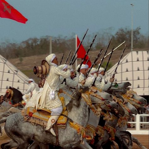 Feeling the adrenaline rush from this incredible Tbourida performance! 🇲🇦 Can't decide what's cooler - the horsemanship or the synchronized firing 📸 𝚌𝚛𝚎𝚍𝚒𝚝 𝚝𝚘 𝚞𝚗𝚔𝚗𝚘𝚠𝚗 📥 𝖣𝗆 𝖿𝗈𝗋 𝖼𝗋𝖾𝖽𝗂𝗍 𝗈𝗋 𝗋𝖾𝗆𝗈𝗏𝖺𝗅 𝑻𝒂𝒎𝒈𝒉𝒓𝒂𝒃𝒊𝒕 𝑽𝒊𝒃𝒆𝒔ᵇʸ ᵏʳʸˢˢᵗᵃˡ 🇲🇦 ⵣ ------------------------------- #WanderlustingMorocco #ForeverInLove #Morocco #Marrakech #TravelMorocco #BeautifulMorocco #MoroccanMagic #berberculture #amazigh #MarrakeshVibes #NorthAfrica #Maroc #VisitMorocco #MoroccanCulture #morocco🇲🇦🌅 #OnlyInMorocco #CulturalVi... Moroccan Astethic, Moroccan Culture Aesthetic, Hajar Core, Morroco Aesthetic, Morrocan Aesthetic, Moroccan Painting, Morocco Culture, Morocco Photography, Morocco Aesthetic