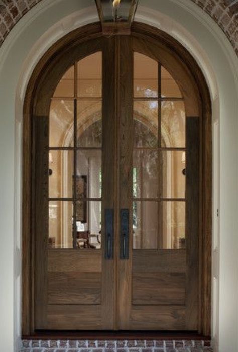 Double Front Entry Doors Brick House, Arched Wood Door Entrance, Front Porch Ideas Double Doors, Double Door Arched Entryway, Cedar French Doors, Wooden Door Arch Design, Arched Wood And Glass Front Door, Dark Wooden Front Door, Front Arch Door