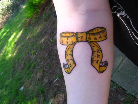 15 tattoo ideas for *extremely* dedicated fashion students- CosmopolitanUK Measuring Tape Tattoo, Crafty Tattoo, Measure Tattoo, Ruler Tattoo, Tape Tattoo, Sewing Tattoo, Nape Tattoo, Gear Tattoo, Bow Tattoo Designs