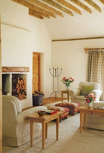 "My entire inspiration came from farm cottages—every detail and proportion. Every room is traditionally Irish, except for the size of the main room," says Pearce. Irish Farmhouse, Irish Cottage, Angela Lansbury, Ideas Hogar, Bungalow Style, Cozy Fireplace, Rustic Living Room, Celebrity Houses, Fireplace Design