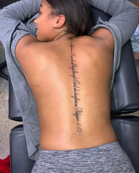 Cross On Back Tattoo Woman, Spine Tattoos For Women Black, Back Tattoo Words, Spine Tattoo Black Women, Word Spine Tattoos For Women, Christian Spine Tattoos For Women, Meaningful Spine Tattoos For Women, Back Tattoo Women Spine, Girls Tattoos