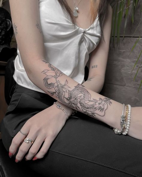 Dragon Tattoo With Flowers For Women Arm, Wrapped Dragon Arm Tattoo, Dragon On Forearm Tattoo, Arm Tattoos For Women Dragon, Tattoo Arm Wrap Around, Arm Dragon Tattoo For Women, Forearm Tattoo Women Dragon, Forearm Dragon Tattoo For Women, Dragon Tattoo For Women Forearm