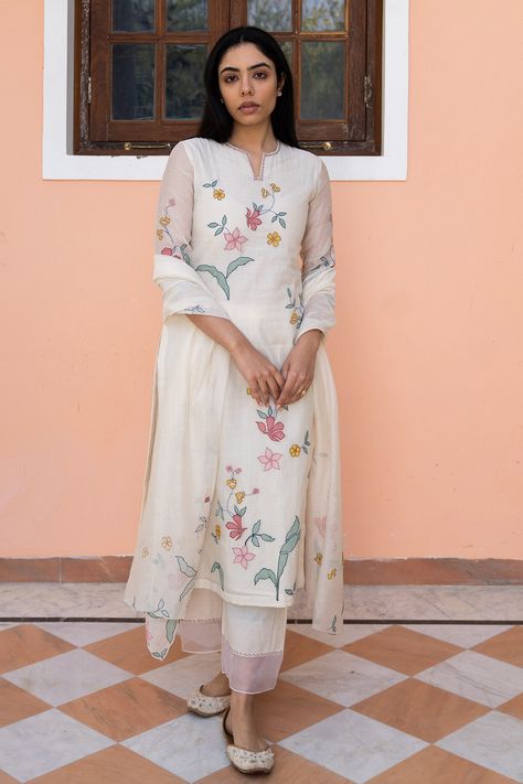 Shop for these amazing collections of White Muslin Cotton Applique Floral Motifs Notched Kurta Pant Set For Women by Vaayu online at Aza Fashions. Applique Kurta, Kurta Pant Set, Applique Work, White Kurta, Kurta Designs Women, Designer Party Wear Dresses, How To Hem Pants, Kurta With Pants, Manish