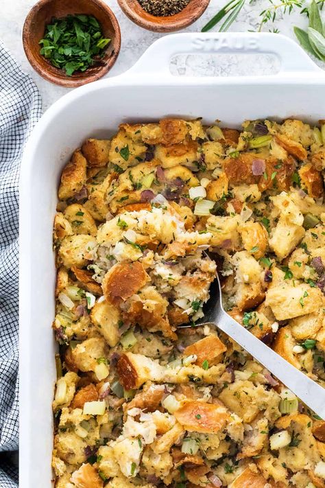 A classic stuffing recipe for your Thanksgiving feast. Herb-infused bread cubes pair nicely with a big plate of turkey and vegetables. #stuffingrecipe #turkeystuffing #thanksgiving Classic Stuffing Recipe, Classic Stuffing, Best Stuffing Recipe, Easy Stuffing Recipe, Gluten Free Sausage, Best Stuffing, Make Garlic Bread, Gluten Free Stuffing, Homemade Stuffing