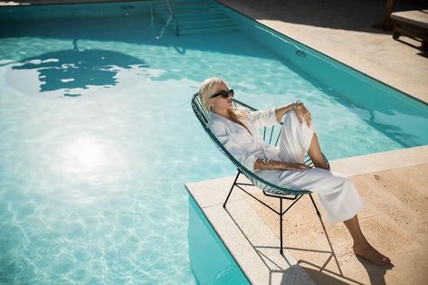 Posing poolside, Pixie Lott wears white pantsuit Pool Fashion Photography, Mirror Editorial, Pool Fashion Editorial, Pool Editorial, Empty Pool, Summer Editorial, Beach Editorial, Swimwear 2021, Pool Photography