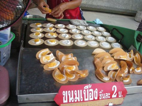 Khanom Buang is a sweet snack found all over Thailand, made by street vendors who have mastered the art. It's history can be traced back 600 years to the Ayuttya Period. We've never found Khanom Buang in an American Thai restaurant. It does take practice, and we've presented a street vendor video below for indispensable guidance. As you watch the video, take note of hand movements. Our recipe is genuine, and tastes fantastic, Khanom Buang, Pancake Griddle, Hand Movements, Street Vendors, Dry Coconut, Street Vendor, Wooden Spatula, Thai Restaurant, Pancake Batter