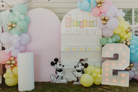 Small World Backdrop, Disneyland Theme Backdrop, Vintage Disneyland Backdrop, Pastel Disney Birthday Party, Disneyland Birthday Backdrop, Disney Party Themes, Disneyland 2nd Birthday, Disneyland Backdrop Party Ideas, Disneyland Party Backdrop