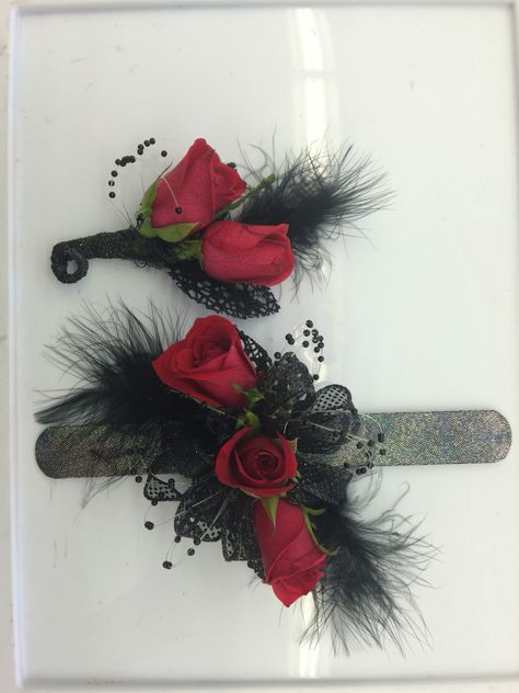 Red and black corsage and Boutonniere Red Black Corsage, Corsages And Boutonnieres Homecoming, Black And Red Boutonniere, Red And Black Corsage And Boutonniere, Corsage Red And Black, Black And Red Corsage, Black Corsage And Boutonniere, Red And Black Corsage, Ring Corsage