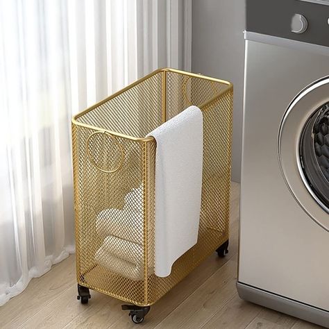 PRICES MAY VARY. ★【Stylish and Durable】: Our laundry basket is made of metal with high-density painting and welding process, the whole is strong, stable, wear-resistant and rustproof, which adds an element of fashion as well as convenience. ★【Hollow Mesh Design】: The laundry basket is designed with a hollow design to keep clothes dry and odor-free, and the simple hollow design and smooth lines bring visual enjoyment. ★【Laundry Basket with wheels】: This laundry basket has a bottom pulley design t Laundry Closet Basket Storage, 3 Compartment Laundry Hamper, Vertical Laundry Basket Storage, Laundry Pods Storage, Space Saving Laundry Hamper, Gold Laundry Basket, Laundry Room With Closet Storage, Laundry Basket With Wheels, Laundry Baskets On Wall