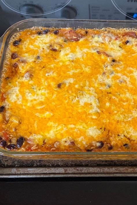 Looking for dinner ideas? Try cooking this pork, black beans, and rice casserole. Use pork, black beans, cream of chicken soup, Rotel, white rice, corn, and cheddar cheese to cook theis quick and easy Mexican-inspired casserole for dinner. #dinnerideas #dinnerrecipes #familydinnerideas #casserole #casserolerecipes #hotdish Pulled Pork And Rice Casserole, Mexican Pork Casserole, Pork Black Beans And Rice, Pork Rice Casserole, Recipes With Rotel, Beans And Rice Casserole, Bean And Rice Casserole, Pork And Rice Casserole, Chilli Casserole