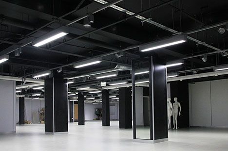 Black Exposed Ceiling, Exposed Services, Black Drop Ceiling, Fashion Retail Interior, Tiles Showroom, Gaming Lounge, Exposed Ceilings, Commercial Office Design, Industrial Office Design