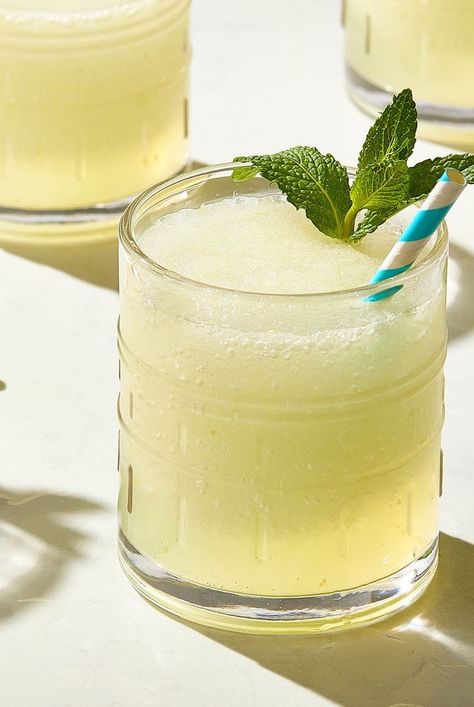 Learn how to make an Icy Lemon-Ginger Vodka cocktail, a frozen, summer cocktail that calls for vodka, mint sprigs, ginger syrup, lemon juice, and lemon zest. Flavored Ice Cubes, Cocktail Food, Ginger Cocktails, Lemon Cocktail, Frozen Lemon, Vodka Cocktail, Ginger Syrup, Frozen Cocktails, Lemon Ginger