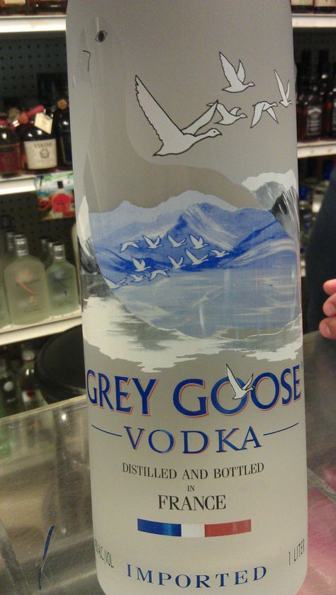 An interesting history about grey goose vodka is that it was made out of the spirit of competition.It was made to compete with Belvedere when it was first created in 1996 and Grey Goose came along and followed suit.Grey goose was intended for the U.S. market because it was an American investor who sent out a team to France. He dispatched a team to France to make the world's best tasting vodka. Grey goose is distributed around the world but was first tested in other test market areas for success. Grey Goose Bottle, Grey Goose Vodka, Grey Goose, Evian Bottle, Liquor Bottle, Interesting History, Liquor Bottles, Favorite Drinks, Vodka Bottle