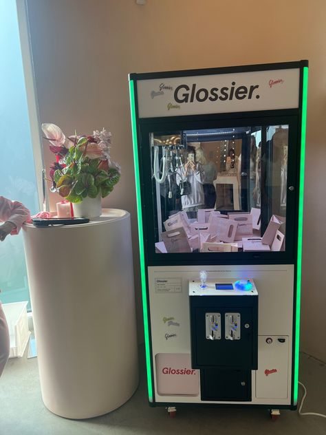 glossier LA claw machine Wedding Claw Machine, Pop Up Brand Activation, Makeup Vending Machine, Clothes Pop Up Shop, Glossier Event, Glossier Merch, Claw Machine Aesthetic, Brand Activation Ideas, Hamptons Party