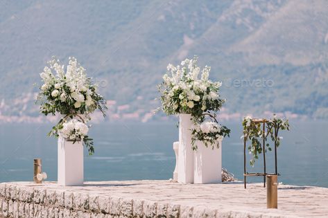 wedding arch decoration with beautiful view by avanti_photo. wedding arch decoration with beautiful view. Destination wedding. #Sponsored #decoration, #arch, #wedding, #beautiful Altar Flowers Wedding, Wedding Cermony, Acrylic Pedestal, Alter Flowers, Wedding Pillars, Wedding Alters, Display Pedestal, Altar Flowers, Arch Decoration