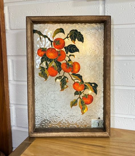 This artwork is inspired by the fruit called persimmon, which represents everything goes smoothly in Chinese culture. And we could also provide the materials kit of this work for selling. #persimmon #interiordesign #chinesedesign #chineseculture #craft #handicraft #filigree #decorativearts #dıy #diycrafts Persimmon Tree Illustration, Persimmon Jewelry, Persimmon Branch, Persimmon Oil Painting, Cloisonne Art Material, Chinese Design, Persimmon, Chinese Culture, Art Decor