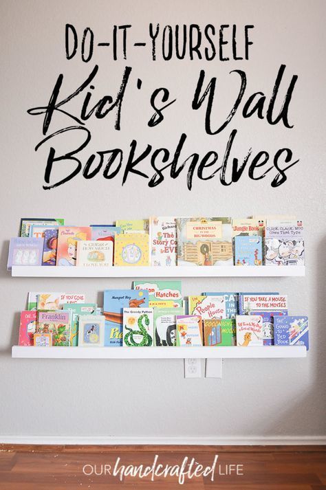 Gorgeous farmhouse style DIY Kid's Bookshelves. These wall mounted bookshelves are easy to make in an afternoon, but they have classic farmhouse style. They will encourage reading by displaying all the book covers for little ones to choose from. They also promote independence because kids are able to pick out books and put them back all by theirselves. These book shelves are perfect for a nursery or kid's bedroom. DIY Wall Mounted Kid's Bookshelves http://ourhandcraftedlife.com/diy-wall-mounted- Wall Bookshelves Kids, Diy Bookshelf Kids, Floating Bookshelves, White Bookshelves, Wall Mounted Bookshelves, Diy Wand, Small Bedrooms, Wall Bookshelves, Book Wall