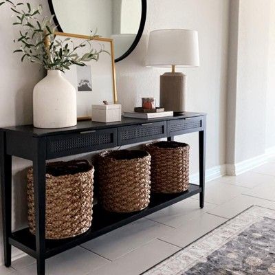 Woven Drawer Console Table, Black Metal Entryway Table, Black Console Table Entryway Decor, Black Hall Console Table, Console Table Studio Mcgee, Entry Way Table Black, Black Cane Console Table, Entryway Ideas Black Table, Black Console With Baskets