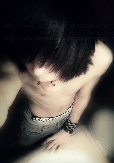 An emo boy with snake bite piercings, black hair holding up his camera at a high angle to take a selfie. He has on no shirt and is wearing a bracelet and pants with the hem of his boxers showing. His hair covers his face. Emo Scene Boys, Emo 2000s, Scene Guys, Emo People, Estilo Emo, Emo Love, Emo Men, Emo Boy