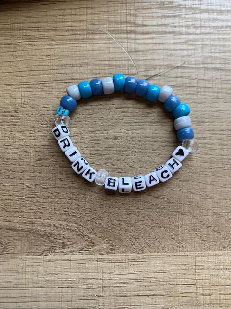 Hand made beaded Bracelet! One size fits all (let me know in the personalization tab if you would like it to be on the bigger or smaller side). I use a clear elastic band that can stretch. Nail polish is used to seal the string together. Let me know if you would like a color other than blue :) Bracelets With Words Funny, Funny Bead Bracelets, Funny Pony Bead Bracelets, Cute Bracelet Making Ideas, Clay Bead Bracelet Ideas Emo, Things To Put On Bracelets, Bracelet Letter Ideas, Fun Bracelet Ideas, Beaded Bracelets Funny